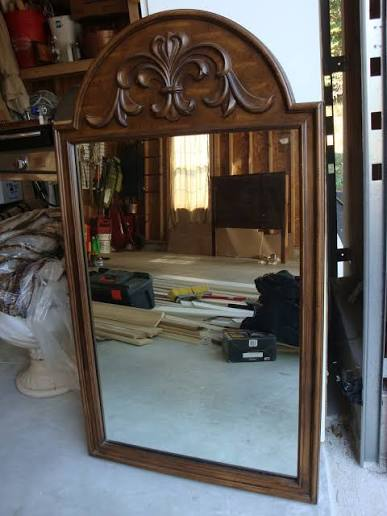 Arched wood-framed vintage mirror with carved crest, rescued for etching